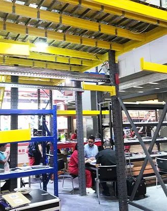 HEDA Shelves engineers discussing mezzanine layout designs with clients